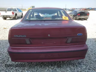 1990 Ford Taurus z VIN 1FACP54Y5LA145772, wystawiony jako Copart lot #69129894 z przebiegiem 617 051 mil mil oraz Czysty tytuł • Clean title. Historia ofert i sprzedaży dostępna na DreamBid. Obrazek 6.
