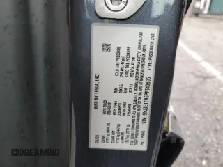 2023 Tesla Model 3 with VIN 5YJ3E1EA5PF640805, listed as a Copart auction lot 48389265 with 28,193 mi miles and Salvage title. Bid and sale history available at DreamBid. Image 14.