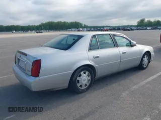 2003 Cadillac DeVille with VIN 1G6KD54YX3U102528, listed as a IAAI auction lot 42159424 with 108,720 mi miles. Bid and sale history available at carsss.com. Image 4.