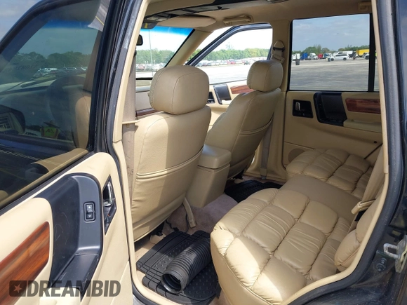 1995 Jeep Grand Cherokee Limited with VIN 1J4GZ78Y0SC578277, listed as a IAAI auction lot 42082848 with 174,288 mi miles. Bid and sale history available at carsss.com. Image 8.