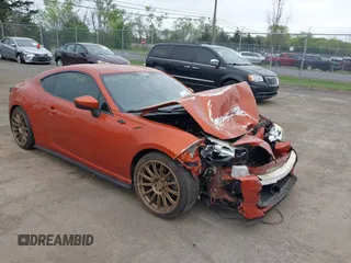 2014 Scion FR-S z VIN JF1ZNAA16E9703911, wystawiony jako IAAI lot #42079578 z przebiegiem 95 754 mil mil oraz . Historia ofert i sprzedaży dostępna na DreamBid. Obrazek 1.