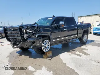 2015 GMC Sierra 2500HD Denali z VIN 1GT120E87FF585064, wystawiony jako Copart lot #58595185 z przebiegiem Nie podano mil oraz Czysty tytuł • Clean title. Historia ofert i sprzedaży dostępna na DreamBid. Obrazek 1.