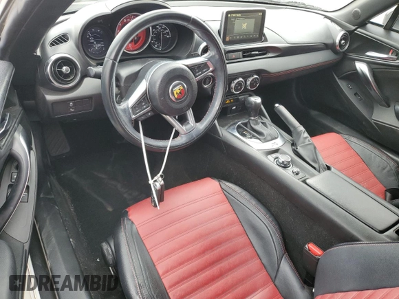 2019 FIAT 124 Spider Urbana Edition z VIN JC1NFAEK2K0142905, wystawiony jako Copart lot #87458644 z przebiegiem 33 680 mil mil oraz Szkoda całkowita • Salvage title. Historia ofert i sprzedaży dostępna na DreamBid. Obrazek 8.