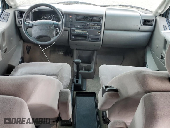 1999 Volkswagen EuroVan с VIN WV2MH8708XH001005, выставлен на аукционе Copart как лот 48987245 с пробегом 210 081 миль миль и Чистый • Clean title. История ставок и продаж доступна на DreamBid. Изображение 8.