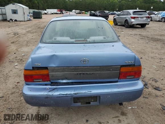 1995 Toyota Corolla DX with VIN 2T1AE09B5SC127586, listed as a Copart auction lot 57075045 with 244,969 mi miles and Salvage title. Bid and sale history available at DreamBid. Image 6.