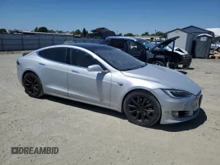 2016 Tesla Model S 90D с VIN 5YJSA1E23GF144496, выставлен на аукционе Copart как лот 64080845 с пробегом 34 847 миль миль и Списание • Salvage title. История ставок и продаж доступна на DreamBid. Изображение 4.