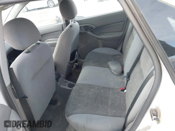 2004 Ford Focus SE with VIN 1FAFP34394W199845, listed as a IAAI auction lot 41896239 with 98,464 mi miles and . Bid and sale history available at DreamBid. Image 8.