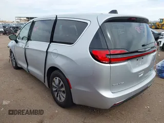2024 Chrysler Pacifica Hybrid Select z VIN 2C4RC1S78RR188462, wystawiony jako IAAI lot #41813616 z przebiegiem 18 589 mil mil oraz . Historia ofert i sprzedaży dostępna na DreamBid. Obrazek 3.