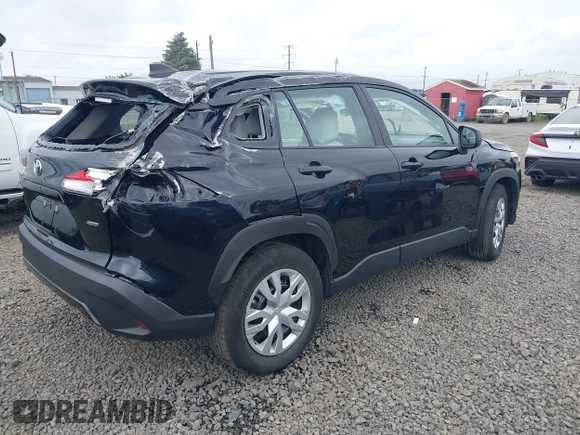 2023 Toyota Corolla Cross L with VIN 7MUAAABG3PV049367, listed as a IAAI auction lot 42370328 with 15,207 mi miles and . Bid and sale history available at DreamBid. Image 4.
