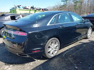 2016 Lincoln MKZ z VIN 3LN6L2G92GR612255, wystawiony jako IAAI lot #41647296 z przebiegiem 130 996 mil mil oraz . Historia ofert i sprzedaży dostępna na DreamBid. Obrazek 4.