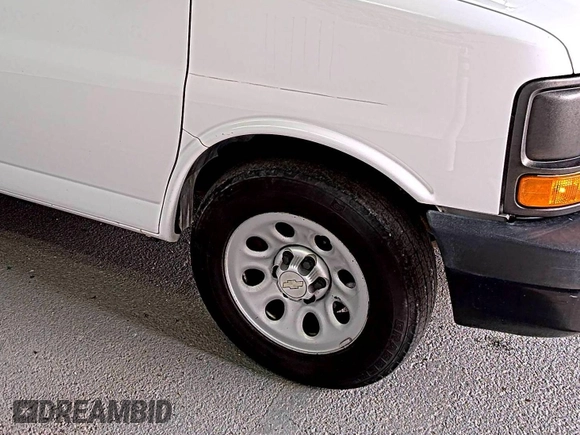 2013 Chevrolet Express Cargo with VIN 1GCSGAFX4D1156427, listed as a IAAI auction lot 42792050 with 229,858 mi miles and . Bid and sale history available at DreamBid. Image 34.