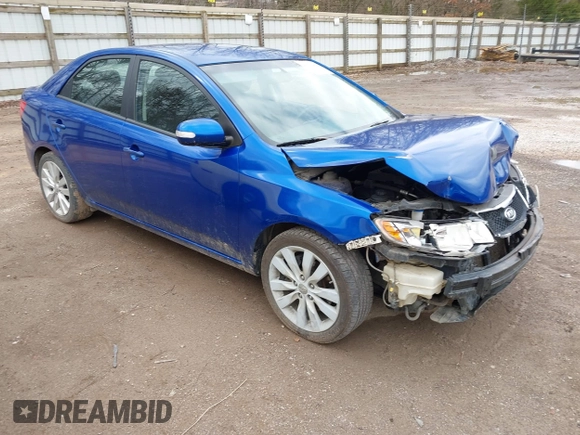 2010 Kia Forte SX with VIN KNAFW4A3XA5250341, listed as a IAAI auction lot 41698461 with 124,334 mi miles. Bid and sale history available at carsss.com. Image 1.