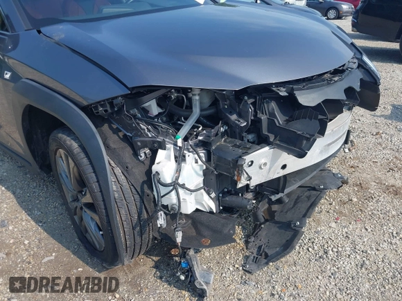 2021 Lexus UX 250h F Sport z VIN JTHE9JBHXM2045377, wystawiony jako IAAI lot #42580566 z przebiegiem 52 838 mil mil oraz . Historia ofert i sprzedaży dostępna na DreamBid. Obrazek 6.