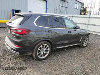 2023 BMW X5 xDrive45e with VIN 5UXTA6C07P9N56075, listed as a Copart auction lot 45962313 with 12,411 mi miles. Bid and sale history available at carsss.com. Image 3.