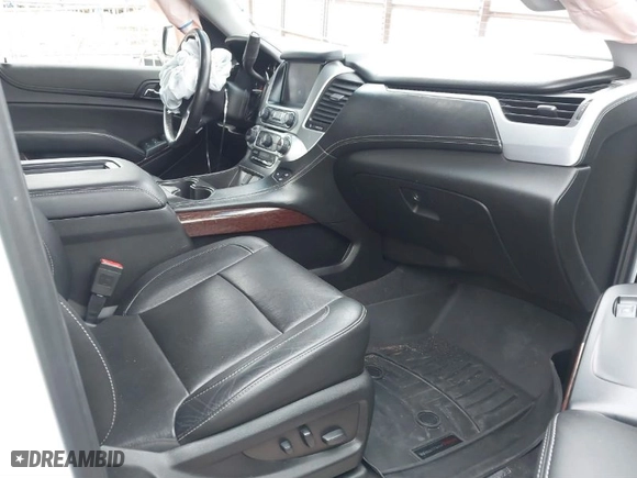 2019 GMC Yukon SLT with VIN 1GKS2BKC6KR183607, listed as a IAAI auction lot 41557880 with 120,971 mi miles. Bid and sale history available at carsss.com. Image 5.