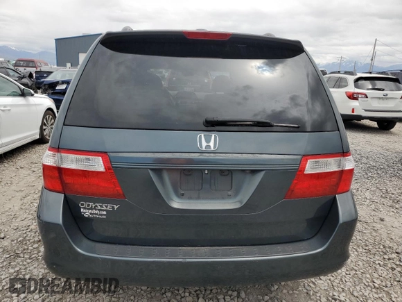 2006 Honda Odyssey EX-L z VIN 5FNRL38786B014188, wystawiony jako Copart lot #57140935 z przebiegiem Nie podano mil oraz Szkoda całkowita • Salvage title. Historia ofert i sprzedaży dostępna na DreamBid. Obrazek 6.