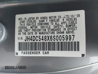 2006 Acura RSX with VIN JH4DC548X6S005997, listed as a IAAI auction lot 41602721 with 92,727 mi miles. Bid and sale history available at carsss.com. Image 9.