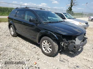 2015 Dodge Journey SXT with VIN 3C4PDCCG4FT697505, listed as a Copart auction lot 64888554 with 191,653 mi miles and Salvage title. Bid and sale history available at DreamBid. Image 4.