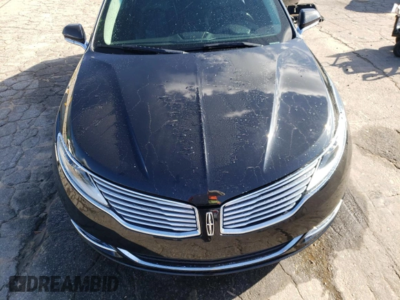 2014 Lincoln MKZ z VIN 3LN6L2GK3ER802789, wystawiony jako Copart lot #86357034 z przebiegiem 215 548 mil mil oraz Szkoda całkowita • Salvage title. Historia ofert i sprzedaży dostępna na DreamBid. Obrazek 11.