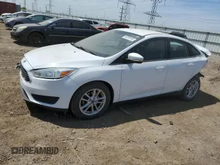 2015 Ford Focus SE z VIN 1FADP3F27FL202628, wystawiony jako Copart lot #56109105 z przebiegiem 69 582 mil mil oraz Szkoda całkowita • Salvage title. Historia ofert i sprzedaży dostępna na DreamBid. Obrazek 1.