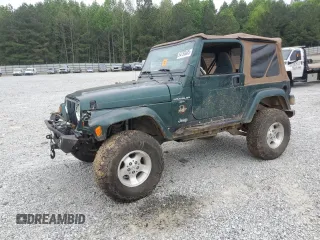 1999 Jeep Wrangler Sahara z VIN 1J4FY49S0XP489462, wystawiony jako Copart lot #54750405 z przebiegiem 134 134 mil mil oraz Nie do naprawy • Non repairable. Historia ofert i sprzedaży dostępna na DreamBid. Obrazek 1.
