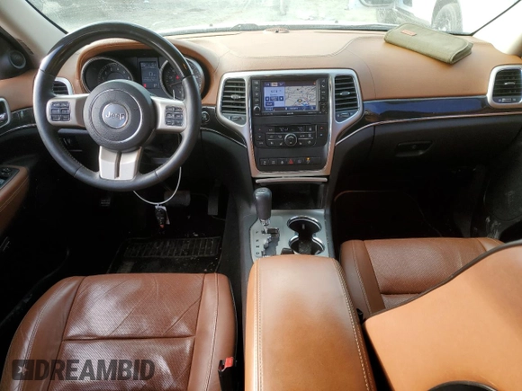 2013 Jeep Grand Cherokee Overland with VIN 1C4RJECT6DC655355, listed as a Copart auction lot 85654554 with 135,343 mi miles and Salvage Title. Bid and sale history available at carsss.com. Image 8.