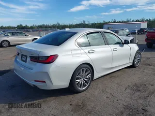 2024 BMW 3 Series 330i with VIN 3MW69FF07R8E63764, listed as a IAAI auction lot 41428605 with 5,355 mi miles. Bid and sale history available at carsss.com. Image 4.