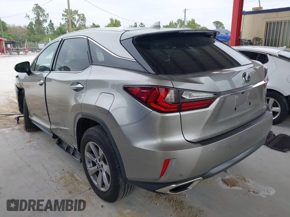 2018 Lexus RX 350 z VIN 2T2BZMCA3JC151296, wystawiony jako IAAI lot #41331203 z przebiegiem 73 051 mil mil oraz . Historia ofert i sprzedaży dostępna na DreamBid. Obrazek 3.