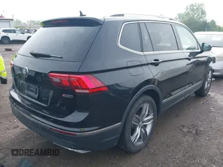 2020 Volkswagen Tiguan SE with VIN 3VV2B7AX8LM177213, listed as a IAAI auction lot 42125606 with 34,578 mi miles and . Bid and sale history available at DreamBid. Image 4.