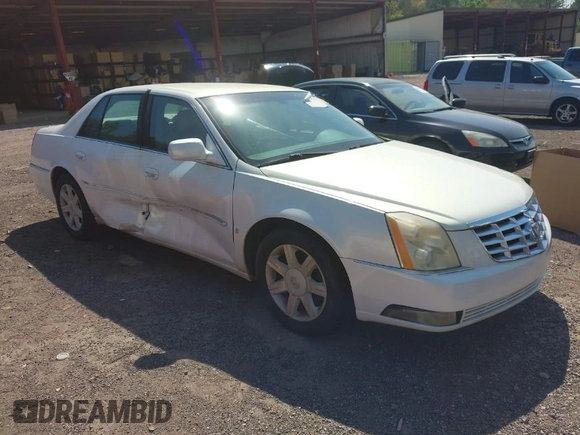 2006 Cadillac DTS w/1SC with VIN 1G6KD57Y56U132648, listed as a IAAI auction lot 41862030 with 128,003 mi miles. Bid and sale history available at carsss.com. Image 1.