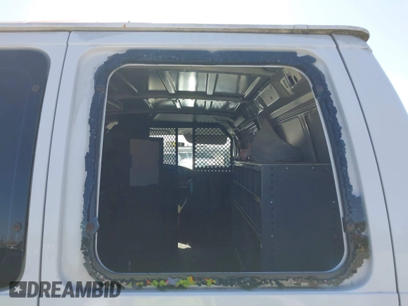 2003 Ford Econoline Cargo with VIN 1FTNE24L23HB81499, listed as a IAAI auction lot 41944485 with 86,629 mi miles and . Bid and sale history available at DreamBid. Image 18.