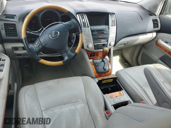 2009 Lexus RX 350 with VIN 2T2GK31U89C063647, listed as a Copart auction lot 51834355 with 212,469 mi miles and Salvage Title. Bid and sale history available at DreamBid. Image 8.