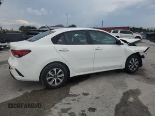 2023 Kia Rio S with VIN 3KPA24AD3PE573452, listed as a Copart auction lot 68249544 with 12,001 mi miles and Non Repairable. Bid and sale history available at DreamBid. Image 3.