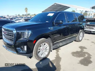 2021 GMC Yukon XL SLT with VIN 1GKS2GKD0MR471504, listed as a IAAI auction lot 41668145 with 55,917 mi miles. Bid and sale history available at carsss.com. Image 21.