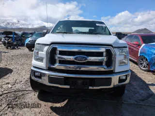 2015 Ford F-150 XLT with VIN 1FTEW1EF5FFB17148, listed as a Copart auction lot 51265215 with 128,011 mi miles and Salvage Title. Bid and sale history available at carsss.com. Image 5.