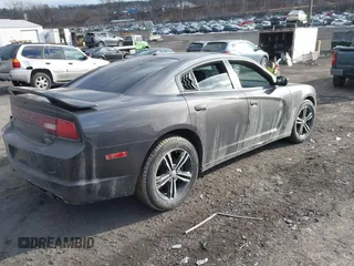 2014 Dodge Charger RT Plus with VIN 2C3CDXDTXEH244650, listed as a IAAI auction lot 41320486 with 126,493 mi miles. Bid and sale history available at carsss.com. Image 4.