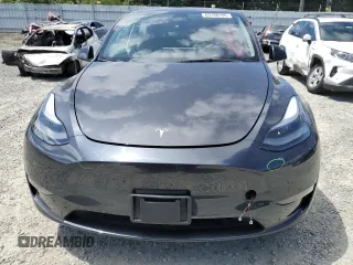 2024 Tesla Model Y с VIN 7SAYGDED1RF053003, выставлен на аукционе Copart как лот 63120195 с пробегом 8 679 миль миль и Списание • Salvage title. История ставок и продаж доступна на DreamBid. Изображение 5.