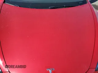 2023 Tesla Model 3 z VIN 5YJ3E1EA3PF645825, wystawiony jako Copart lot #57907795 z przebiegiem 18 810 mil mil oraz Szkoda całkowita • Salvage title. Historia ofert i sprzedaży dostępna na DreamBid. Obrazek 11.