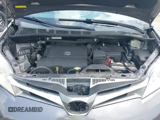 2015 Toyota Sienna XLE with VIN 5TDYK3DCXFS688971, listed as a IAAI auction lot 42127912 with 143,024 mi miles. Bid and sale history available at carsss.com. Image 10.