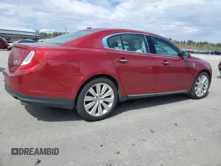 2013 Lincoln MKS EcoBoost with VIN 1LNHL9FT1DG609011, listed as a Copart auction lot 55793575 with Not provided miles and Salvage title. Bid and sale history available at DreamBid. Image 3.