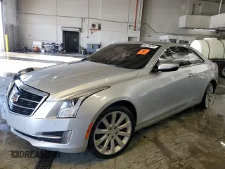 2015 Cadillac ATS Luxury AWD z VIN 1G6AH1RX4F0113934, wystawiony jako Copart lot #84439094 z przebiegiem 56 679 mil mil oraz Szkoda całkowita • Salvage title. Historia ofert i sprzedaży dostępna na DreamBid. Obrazek 1.
