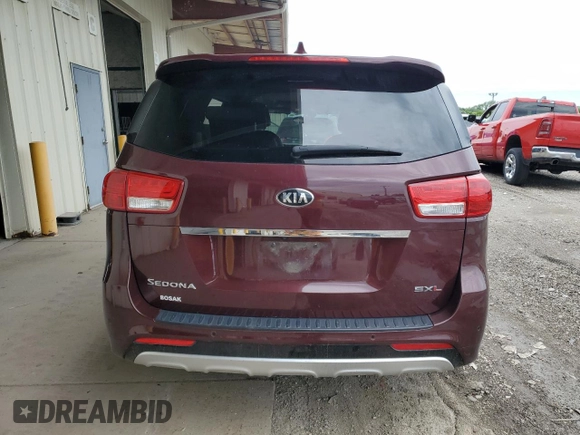 2017 Kia Sedona SX-L with VIN KNDME5C14H6279899, listed as a Copart auction lot 60642874 with 102,658 mi miles and Salvage Title. Bid and sale history available at carsss.com. Image 6.