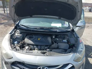 2014 Hyundai Elantra GT with VIN KMHD35LH8EU216052, listed as a IAAI auction lot 42102173 with 112,129 mi miles. Bid and sale history available at carsss.com. Image 10.