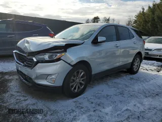 2021 Chevrolet Equinox LT z VIN 2GNAXKEV7M6127901, wystawiony jako Copart lot #87803495 z przebiegiem 59 022 mil mil oraz Szkoda całkowita • Salvage title. Historia ofert i sprzedaży dostępna na DreamBid. Obrazek 1.