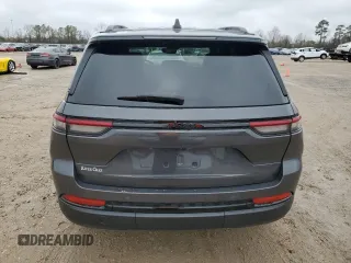 2023 Jeep Grand Cherokee Altitude with VIN 1C4RJGAG7PC573429, listed as a Copart auction lot 42961295 with 9,704 mi miles and Salvage title. Bid and sale history available at DreamBid. Image 6.