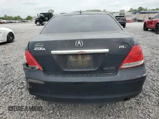 2006 Acura RL z VIN JH4KB16586C010597, wystawiony jako Copart lot #53846535 z przebiegiem 212 219 mil mil oraz Szkody całkowita. Historia ofert i sprzedaży dostępna na DreamBid. Obrazek 6.