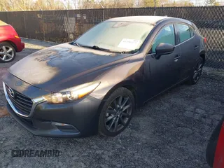 2018 Mazda 3 Touring with VIN 3MZBN1L32JM235162, listed as a IAAI auction lot 41596278 with 144,784 mi miles and . Bid and sale history available at DreamBid. Image 2.