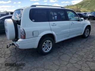 2005 Suzuki XL7 LX z VIN JS3TX92V654106427, wystawiony jako Copart lot #48830364 z przebiegiem 186 515 mil mil oraz Czysty tytuł • Clean title. Historia ofert i sprzedaży dostępna na DreamBid. Obrazek 3.