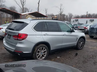 2016 BMW X5 xDrive50i with VIN 5UXKR6C53G0J83329, listed as a IAAI auction lot 41150598 with 81,136 mi miles. Bid and sale history available at carsss.com. Image 4.