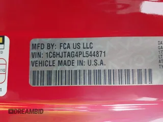 2023 Jeep Gladiator Sport S z VIN 1C6HJTAG4PL544871, wystawiony jako IAAI lot #42382428 z przebiegiem 33 453 mil mil oraz . Historia ofert i sprzedaży dostępna na DreamBid. Obrazek 9.